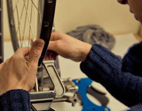 Truing a road wheel